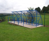 FS38 - Economy cycle shelter for 20 bikes, featuring additional safety barrier hoops