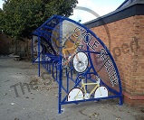 FS67 - Harlan style 10 cycle shelter for 20 cycles with themed end panels